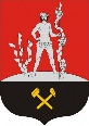 423px-Komlo